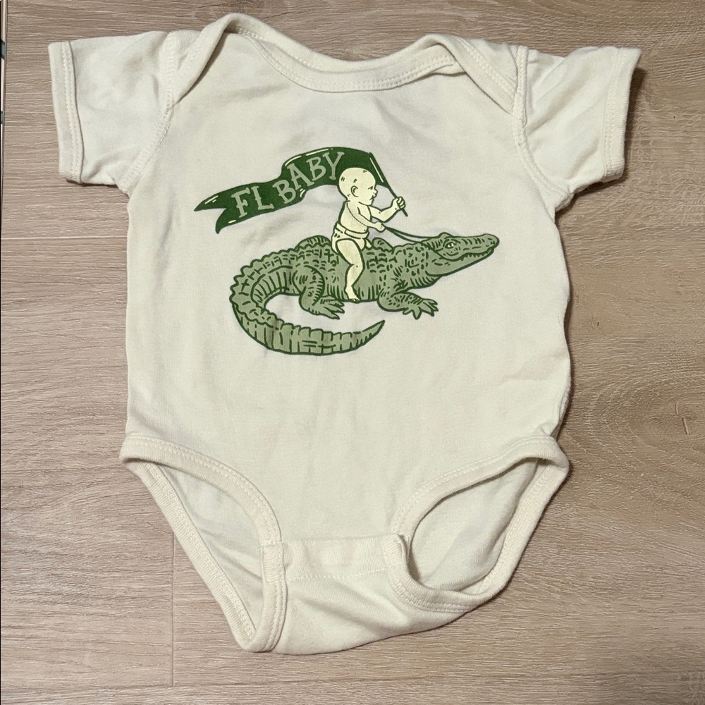 Cream Onesie with Green Alligator Graphic